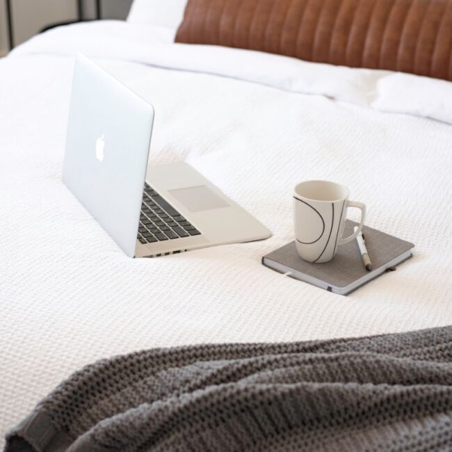 laptop on the bed